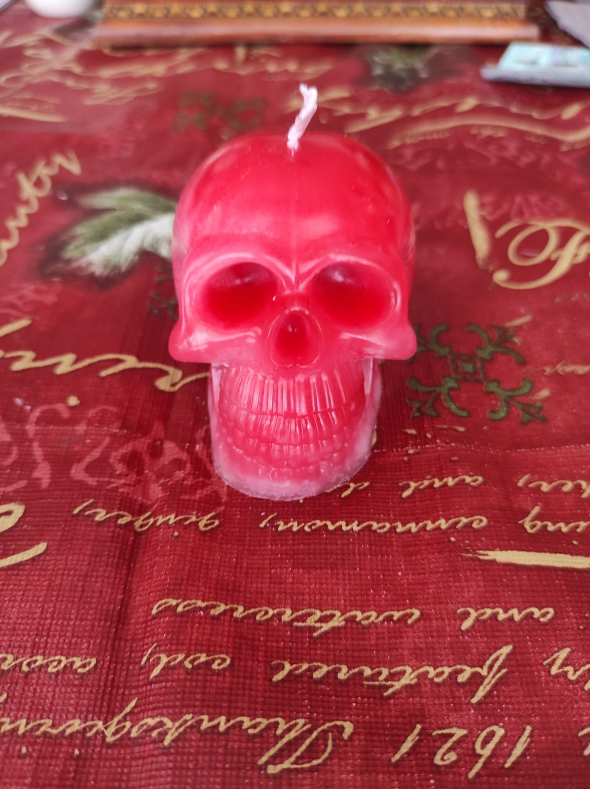 vela calavera roja